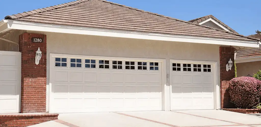 Residential garage door repair service for a double garage door in Santa Ana, CA