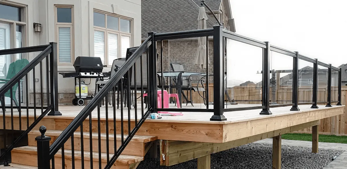 Handrail installation on a deck staircase for safety and code compliance in Santa Ana, CA