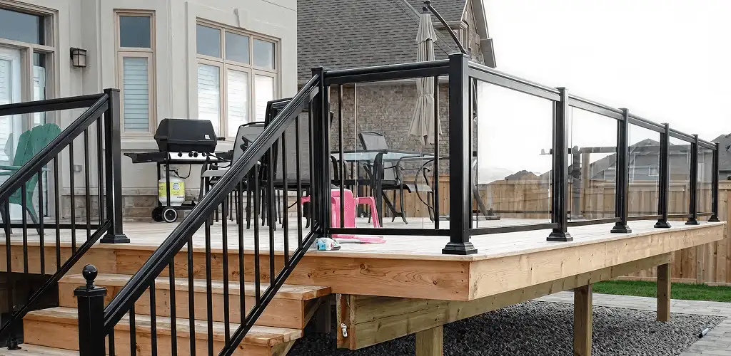 Handrail installation on a deck staircase for safety and code compliance in Santa Ana, CA