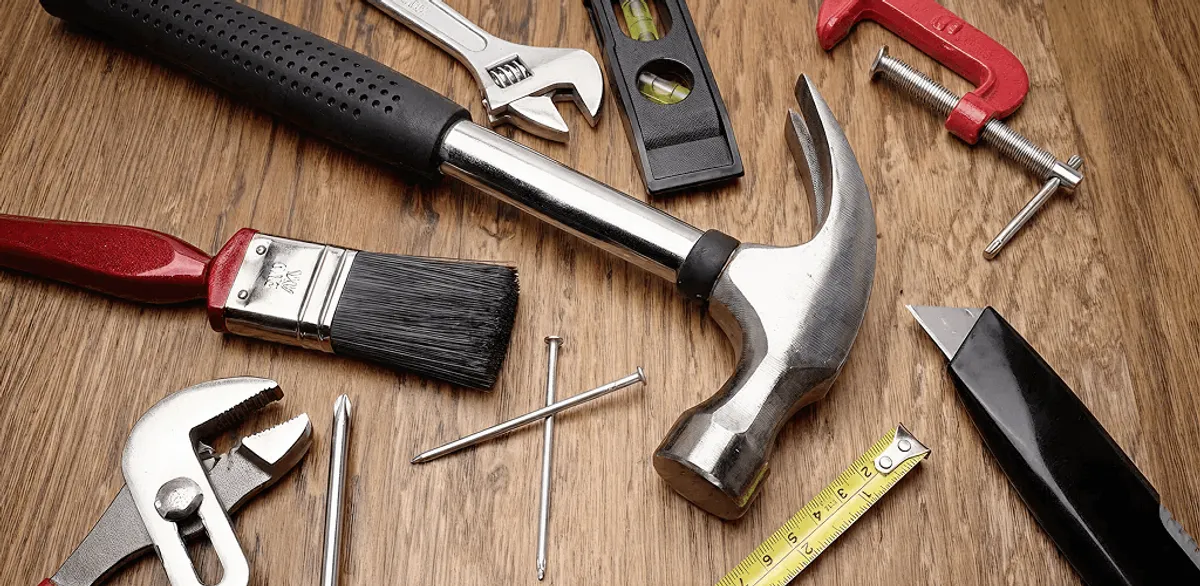 Handyman tools laid out for home repair and maintenance work in Santa Ana, CA