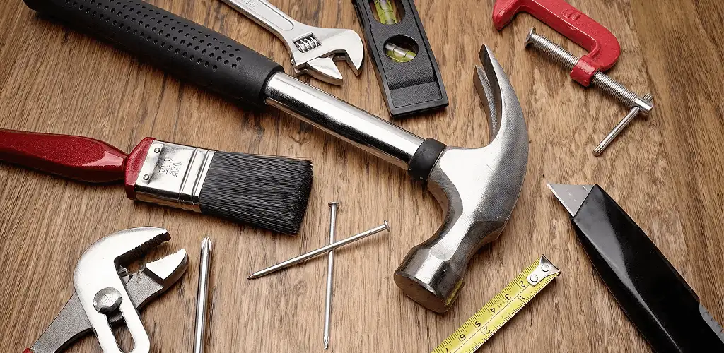 Handyman tools laid out for home repair and maintenance work in Santa Ana, CA