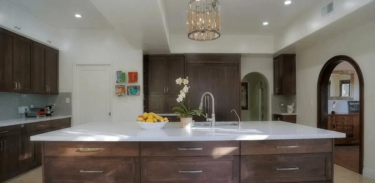 Cabinet refacing project with updated kitchen cabinets and island in Santa Ana, CA