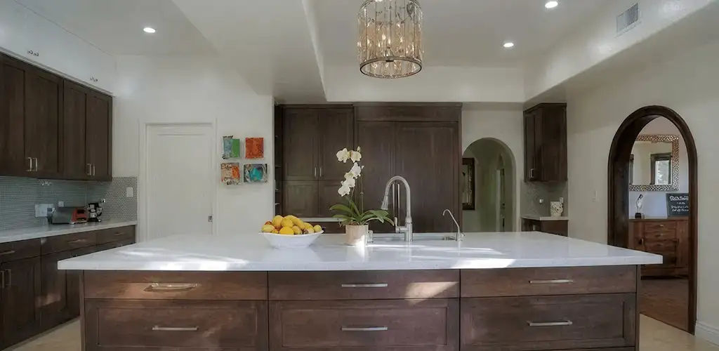 Cabinet refacing project with updated kitchen cabinets and island in Santa Ana, CA